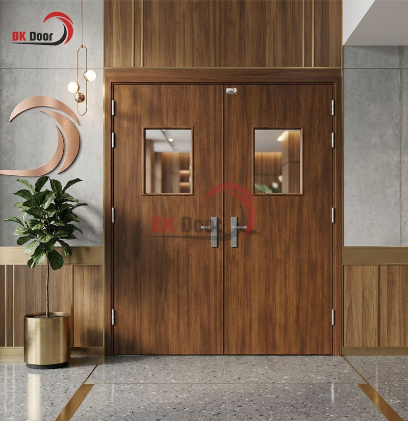 Cửa thép vân gỗ 2 cánh BK Door có ô kính được sử dụng làm cửa thông phòng